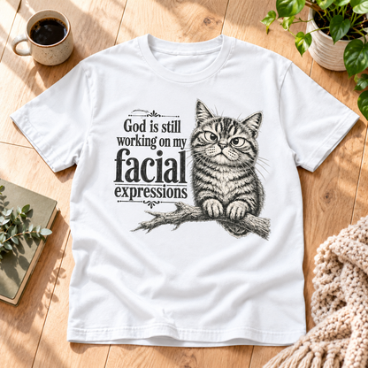 God Is Still Working On My Facial Expressions T-Shirt - Funny Grumpy Cat Graphic Tee